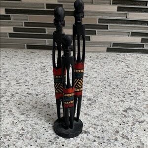 Black and Red Wooden Figurines